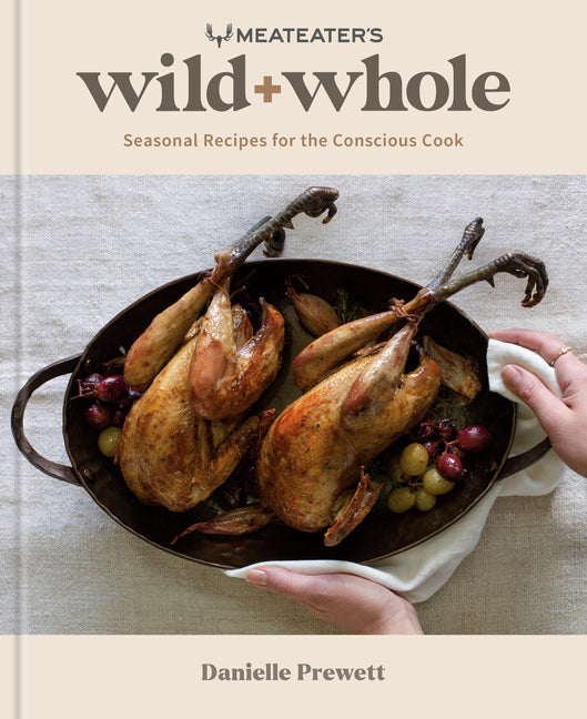 Book cover for Meateater's Wild + Whole: Seasonal Recipes for the Conscious Cook: A Wild Game Cookbook