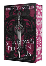 Book cover for The Shadows Between Us