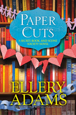 Book cover for Paper Cuts: An Enchanting Cozy Mystery