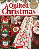 Book cover for Quilted Christmas: 16 Projects to Bring the Warmth of the Season Home