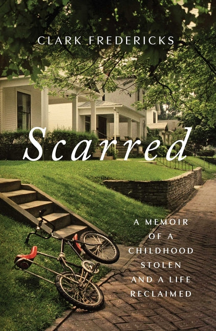 Book cover for Scarred: A Memoir of a Childhood Stolen and a Life Reclaimed