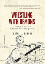 Book cover for Wrestling with Demons: In Search of the Real Ernest Hemingway