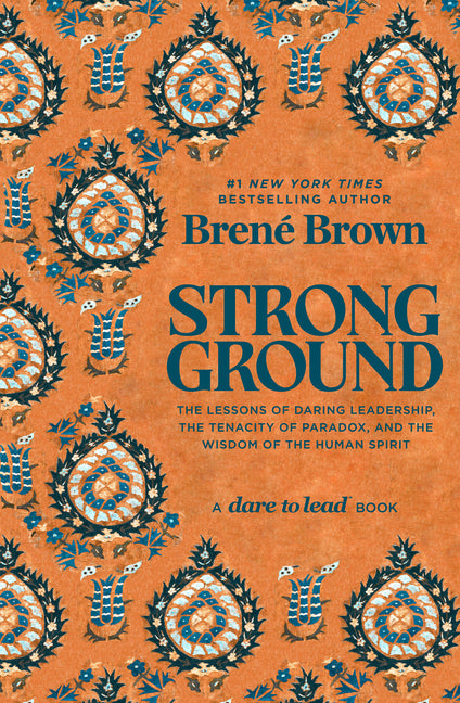Book cover for Strong Ground: The Lessons of Daring Leadership, the Tenacity of Paradox, the Wisdom of the Human Spirit